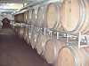 The view of barrels in a winery is a suggestive view, however capable of influencing the emotional tasting of a wine
