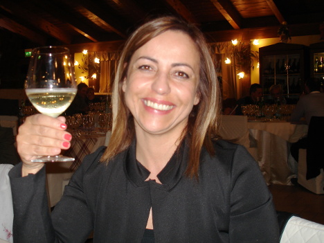 Sonya Zanolla with a glass of Cuve del Fondatore Graziano Merotto