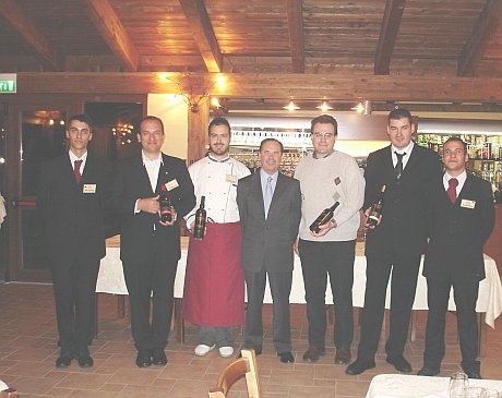 Locanda dei Golosi's staff and, center picture, Emilio Ridolfi and Antonello Biancalana